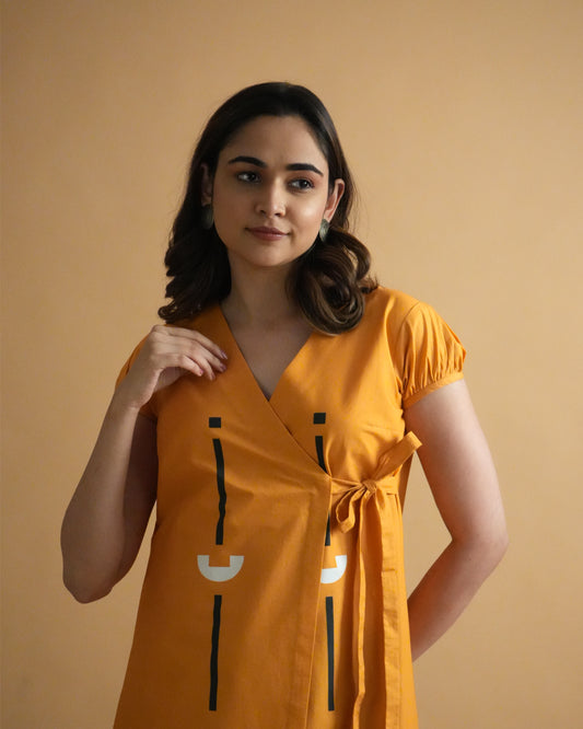 Detailed shot of puff sleeves in vibrant orange cotton from the Kara Cotton Kurta Co-ord Set