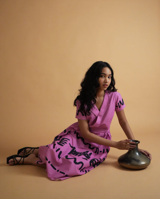 Model wearing Jambu Cotton Co-ord Set with pink lapel-collar kurta, cuffed sleeves, tribal motifs, and wide-leg pants
