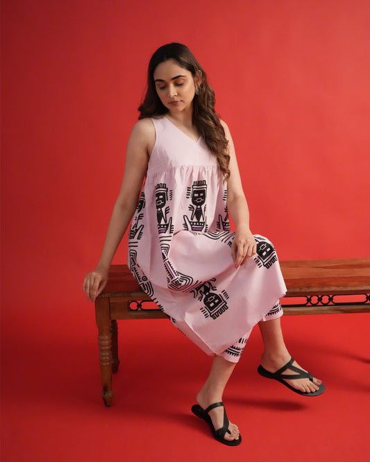 Model wearing Merah Cotton Co-ord Set in powder pink with sleeveless kurta, tribal motifs, and slim pants