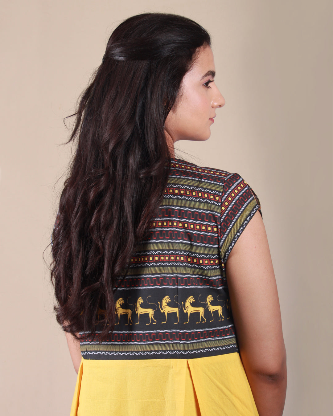 Closeup back view of Amphora Pottery Dress in cotton fabric with printed yoke detail and cap sleeves