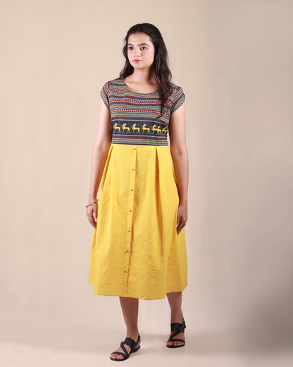 Full side front view of Amphora Pottery Dress in cotton fabric with printed yoke detail and cap sleeves