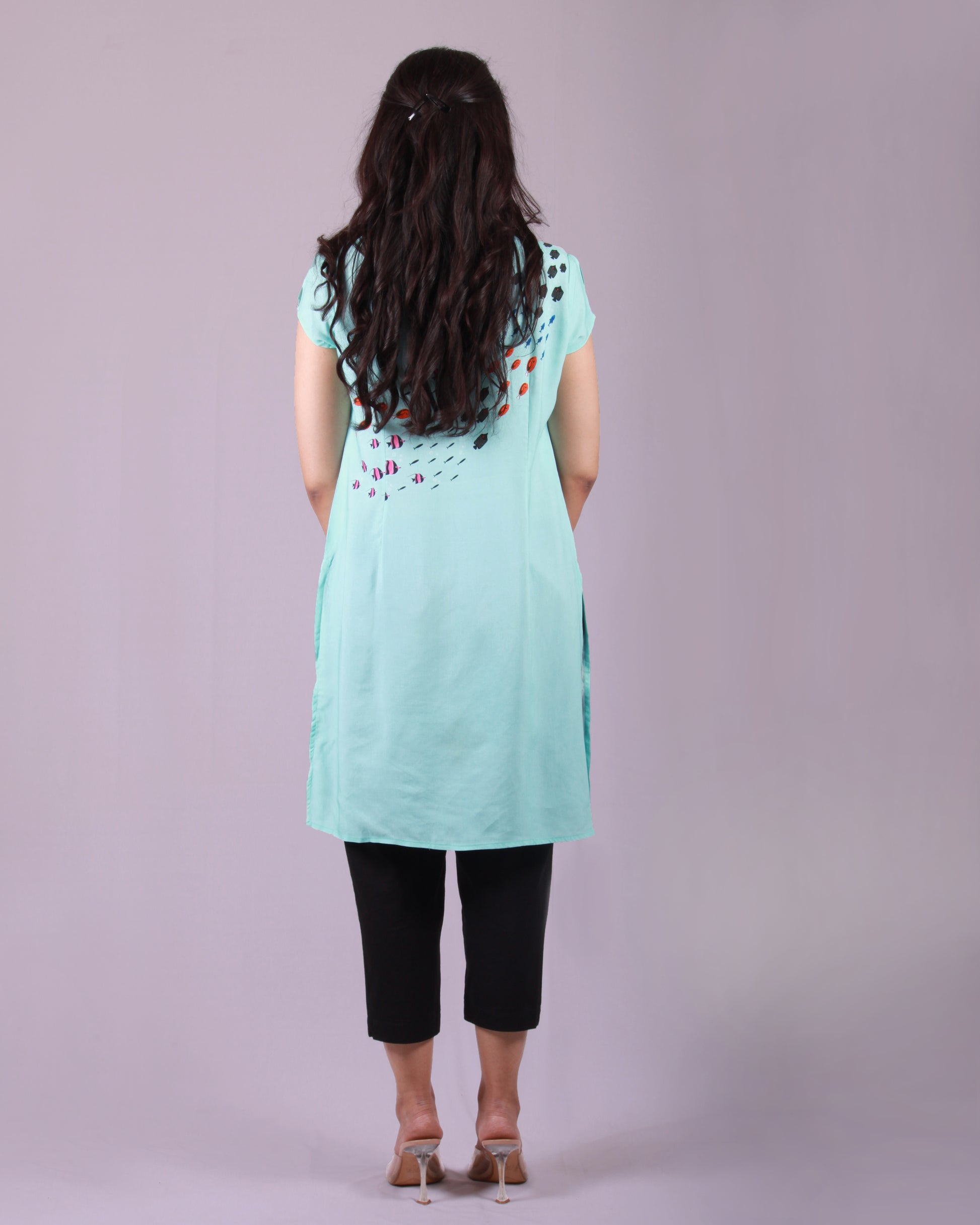 Full back closeup of Blue Fish Current Tunic in cotton blend with an A-line silhouette and cap sleeves