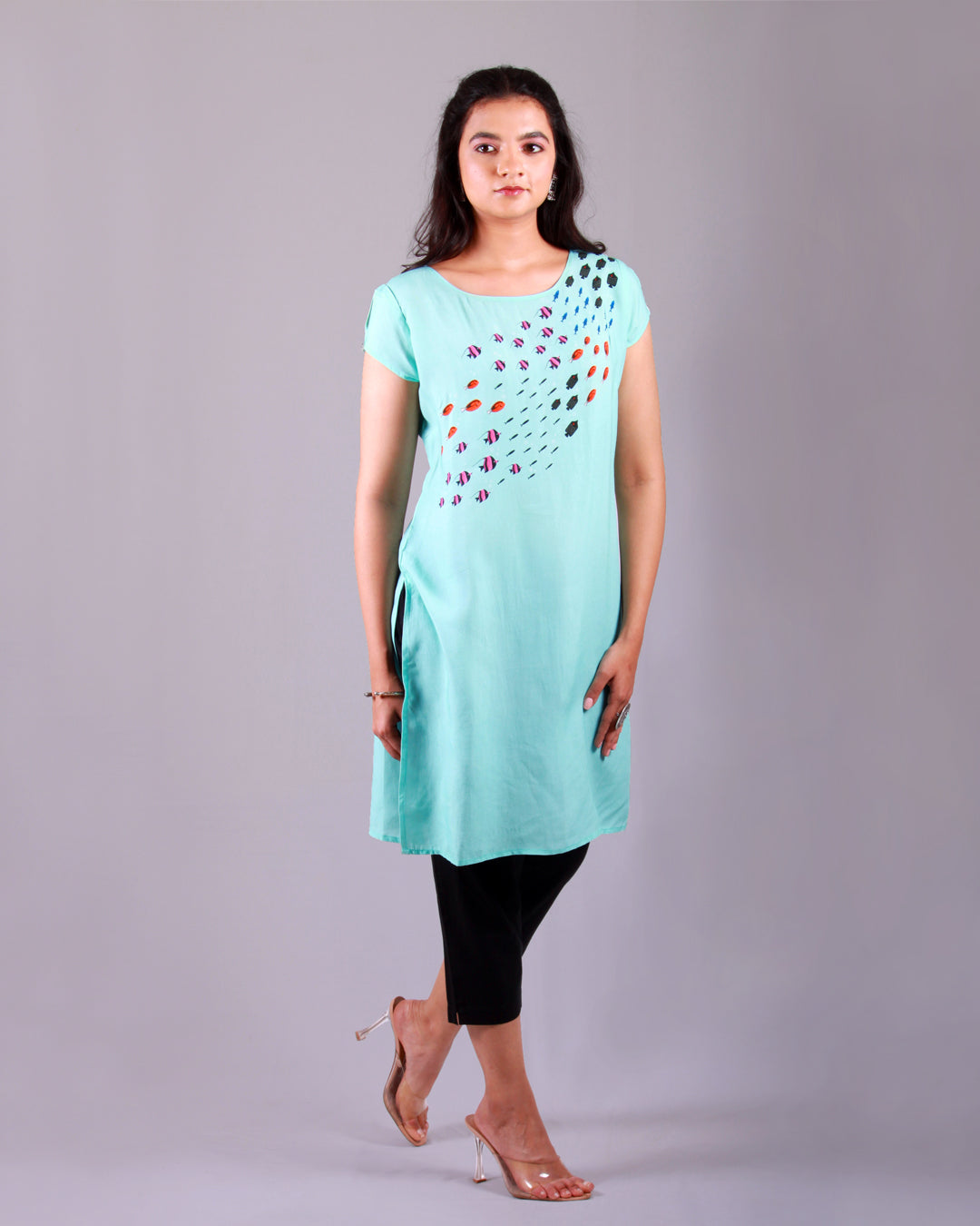 Front full view of Blue Fish Current Tunic in cotton blend with an A-line silhouette and cap sleeves