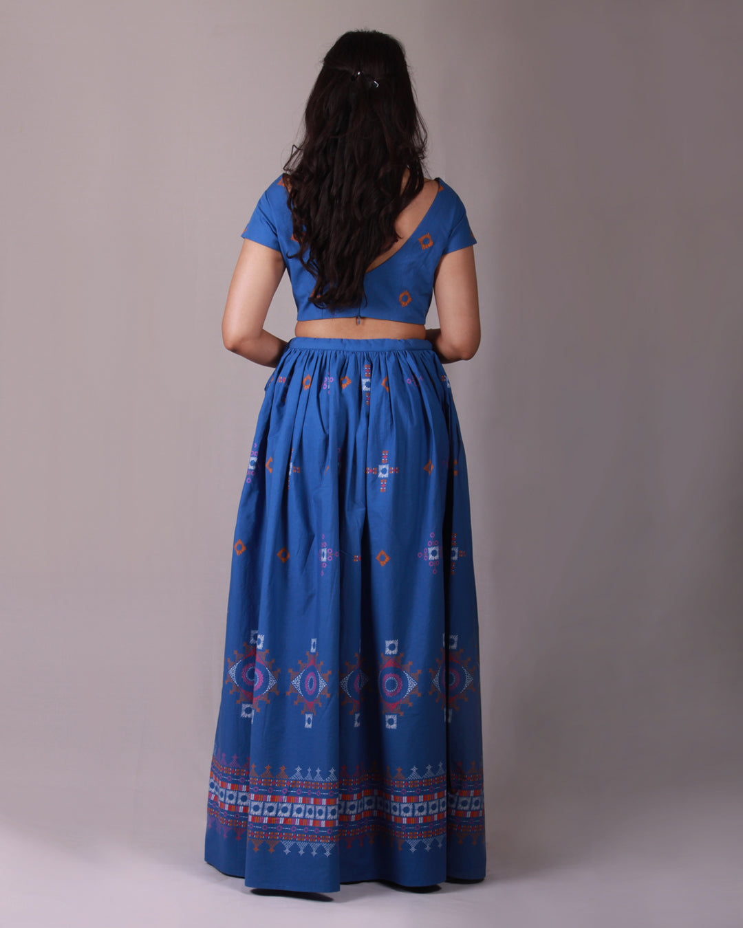 Back view closeup of Blue Lambada Co-ord Set in cotton with chic cap sleeves, playful tassel and shell details