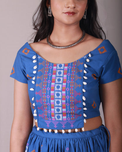 Closeup of croptop of Blue Lambada Co-ord Set in cotton with chic cap sleeves, playful tassel and shell details