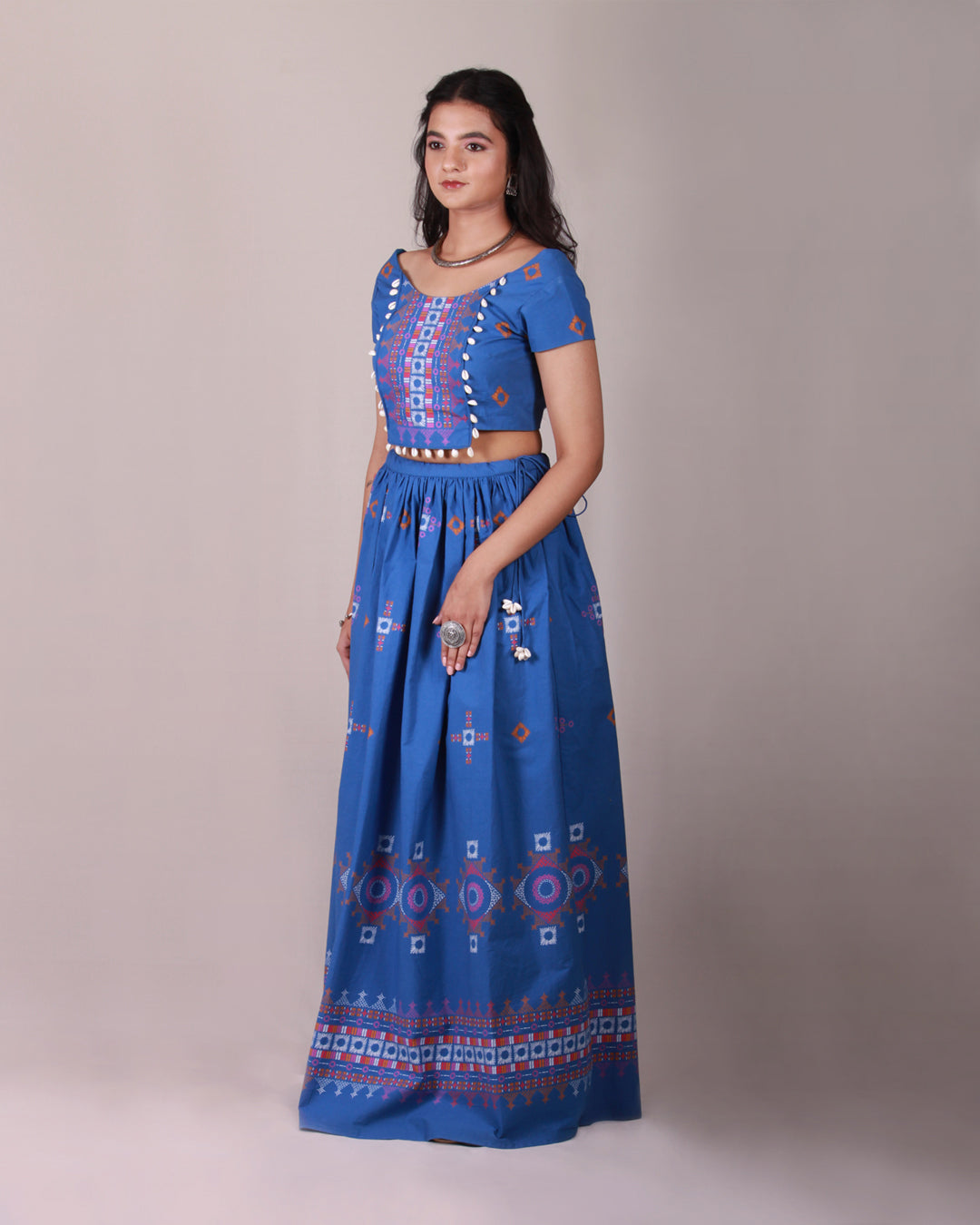 Full side front view of Blue Lambada Co-ord Set in cotton with chic cap sleeves, playful tassel and shell details