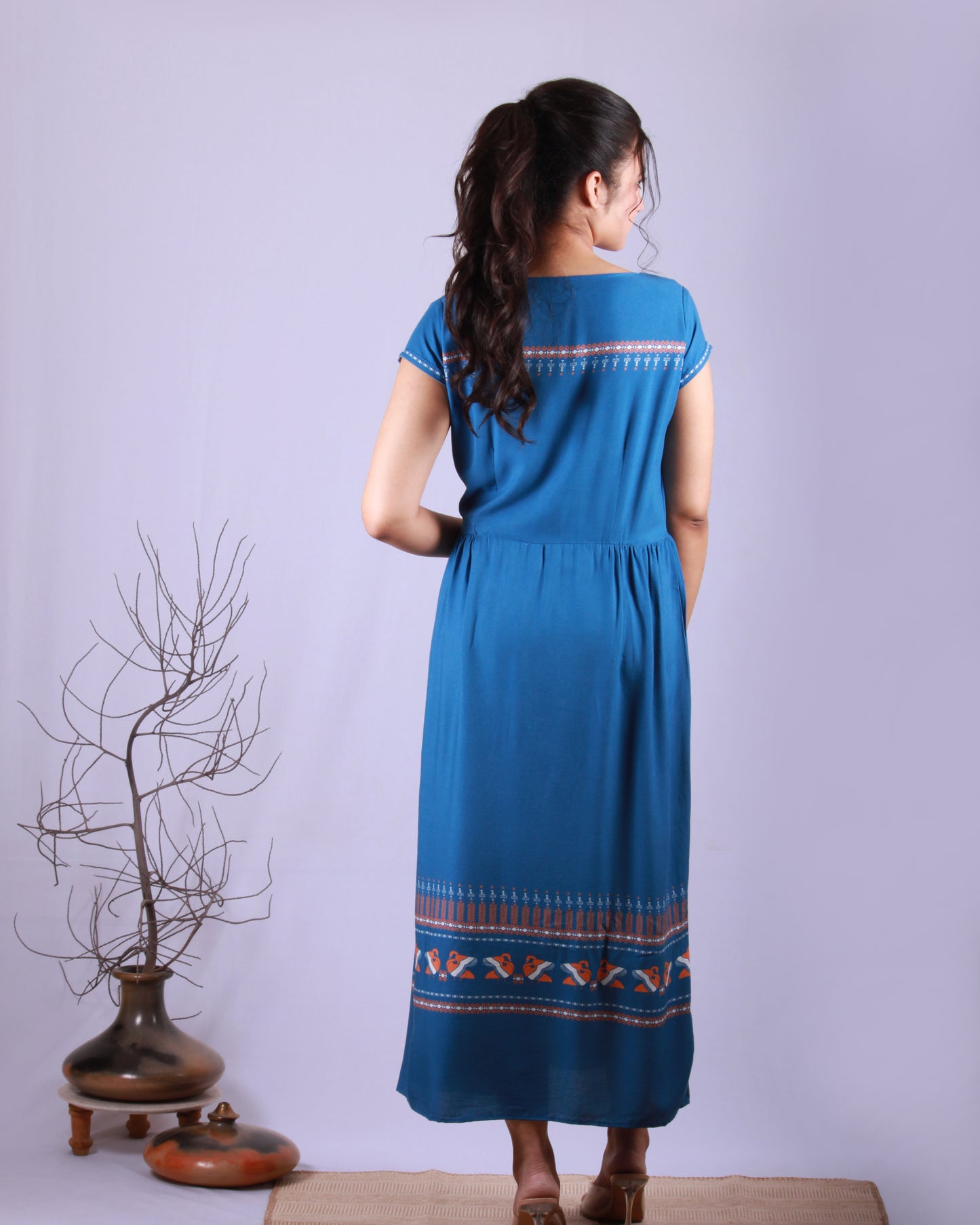 Full back view of Blue Pottery Maxi Dress in cotton blend with drawstring and cap sleeves detail