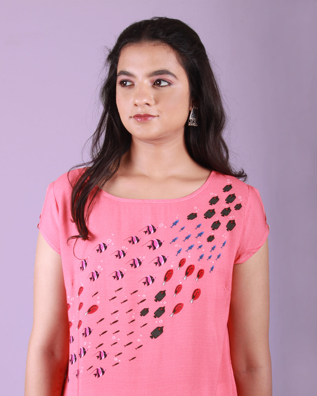 Front closeup of Coral Fish Current Tunic in cotton blend with an A-line silhouette and cap sleeves