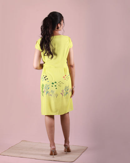 Full back view of Coral Fish Midi Dress in cotton blend with a drawstring and cap sleeves detail