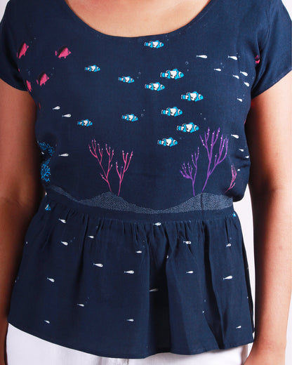 Print detail close up of Deep Blue Marine Top in cotton blend with drawstring and cap sleeves detail