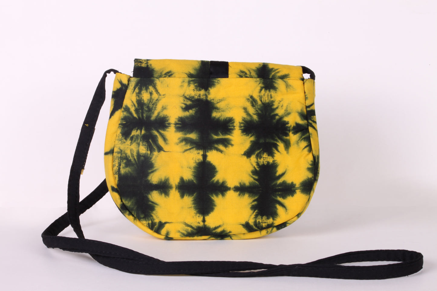 Back view of Yellow Check Sling Bag in cotton tie dye fabric with a magnetic snap closure and an interior pocket