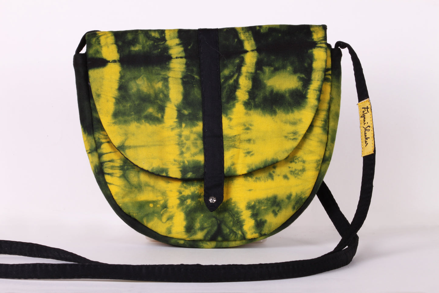 Front view of Yellow Taco Sling Bag in cotton tie dye fabric with a magnetic snap closure and an interior pocket