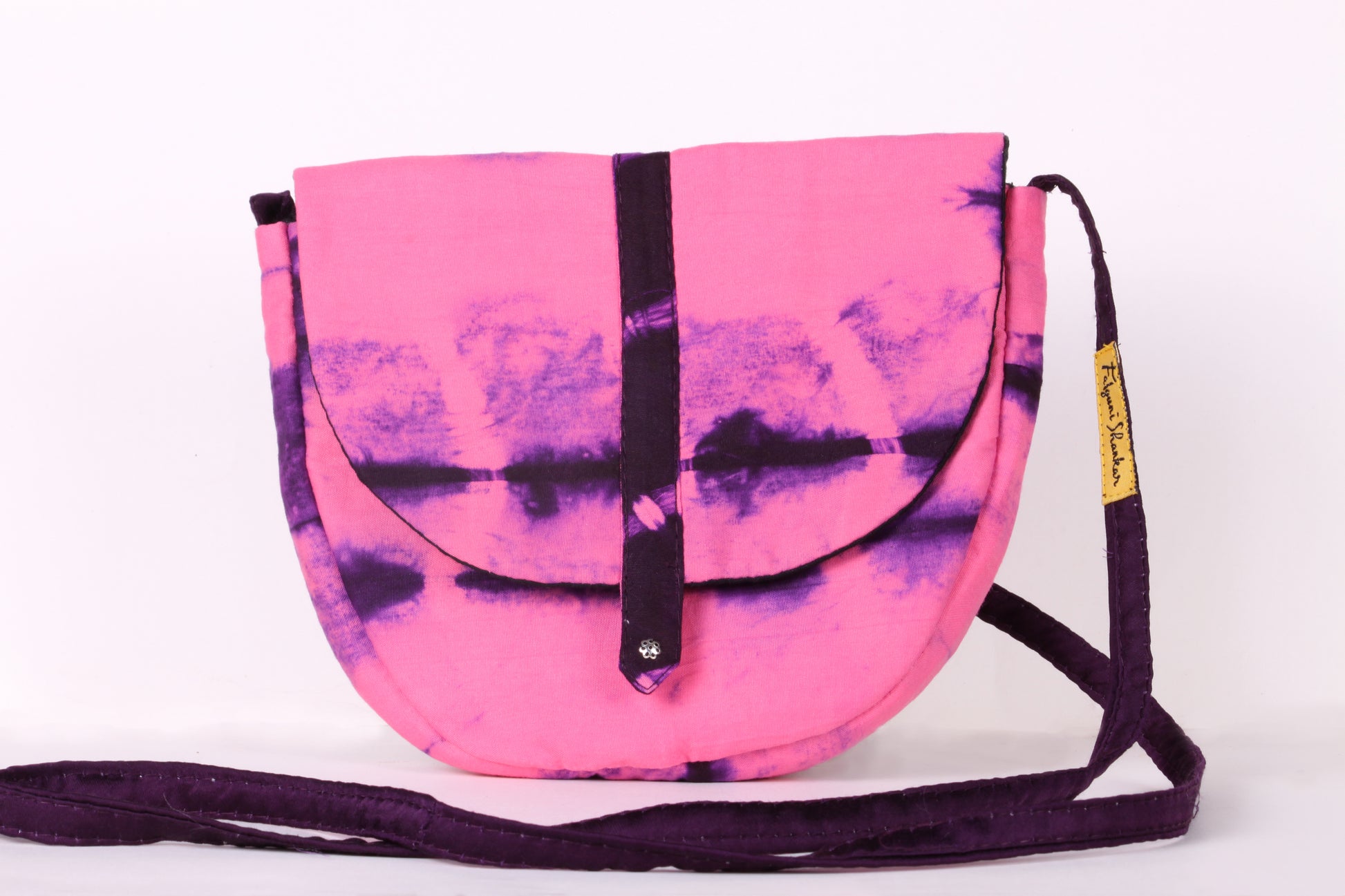 Front view of Pink Taco Sling Bag in cotton tie dye fabric with a magnetic snap closure and an interior pocket