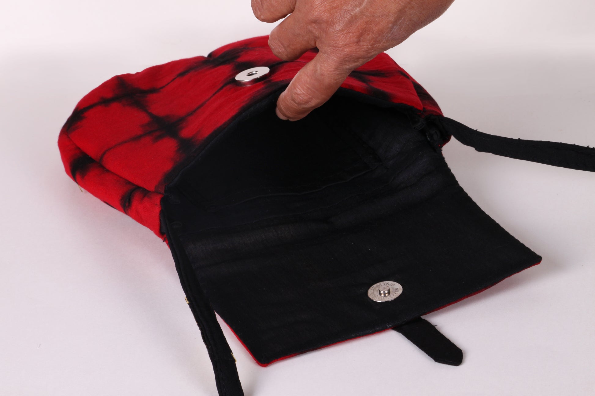 Interior view closeup of Red Check Sling Bag in cotton tie dye fabric