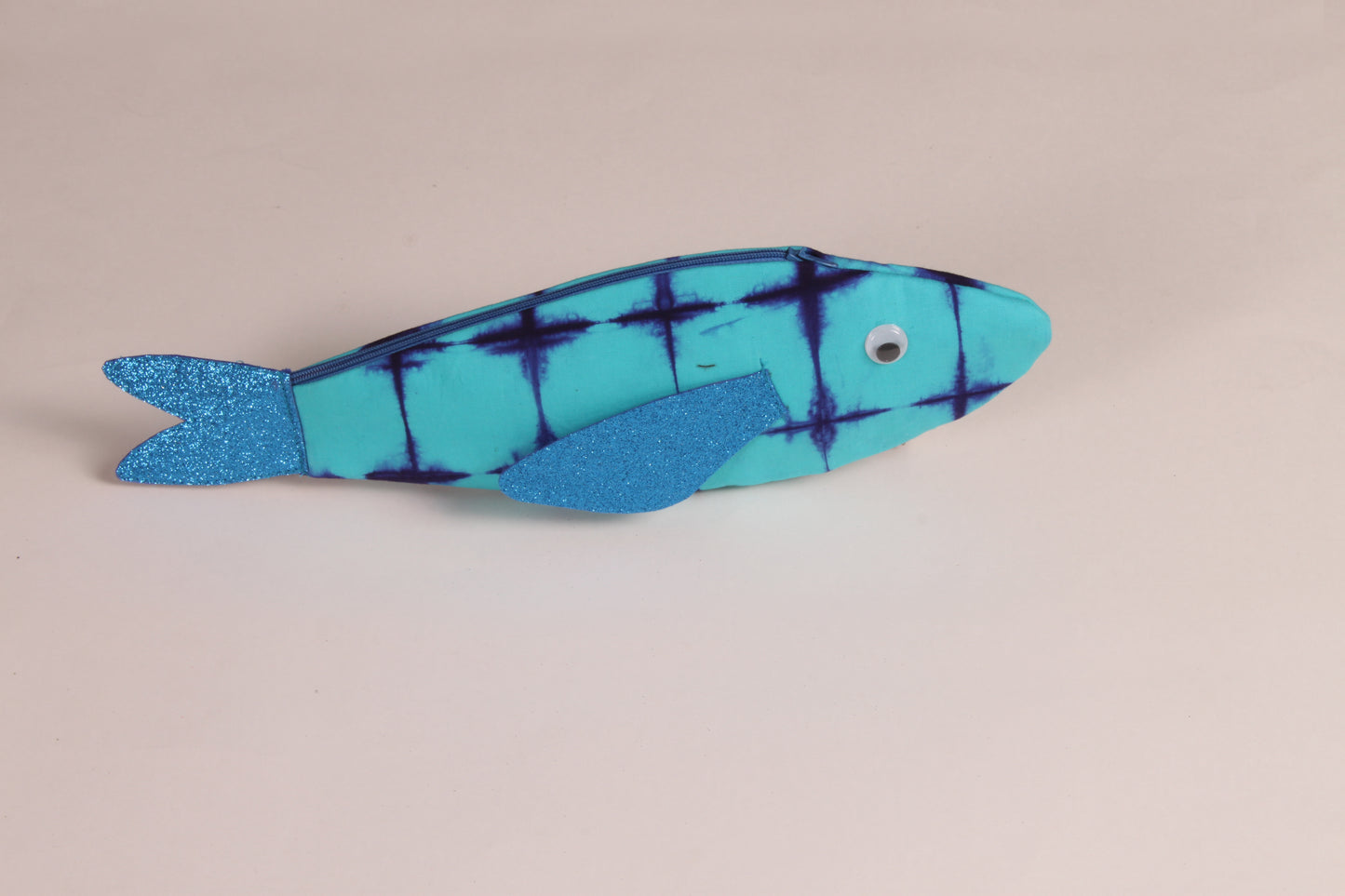 Side view of Blue Rohu Fish Pouch made from cotton fabric with a zip closure