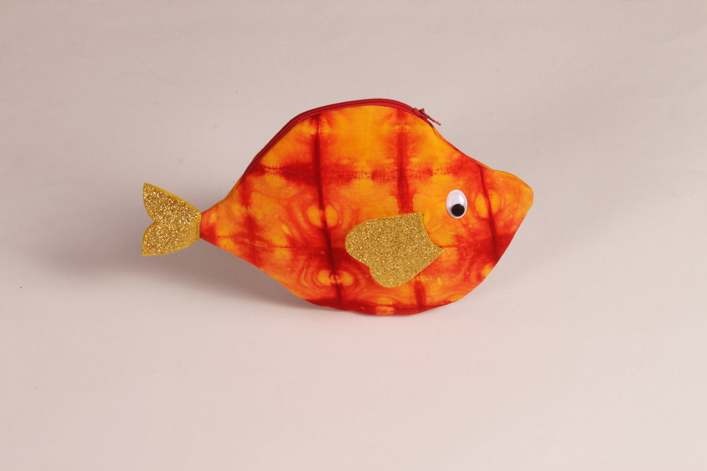 Side view of Golden Yellow Pomfret Fish Pouch made from cotton fabric with a zip closure