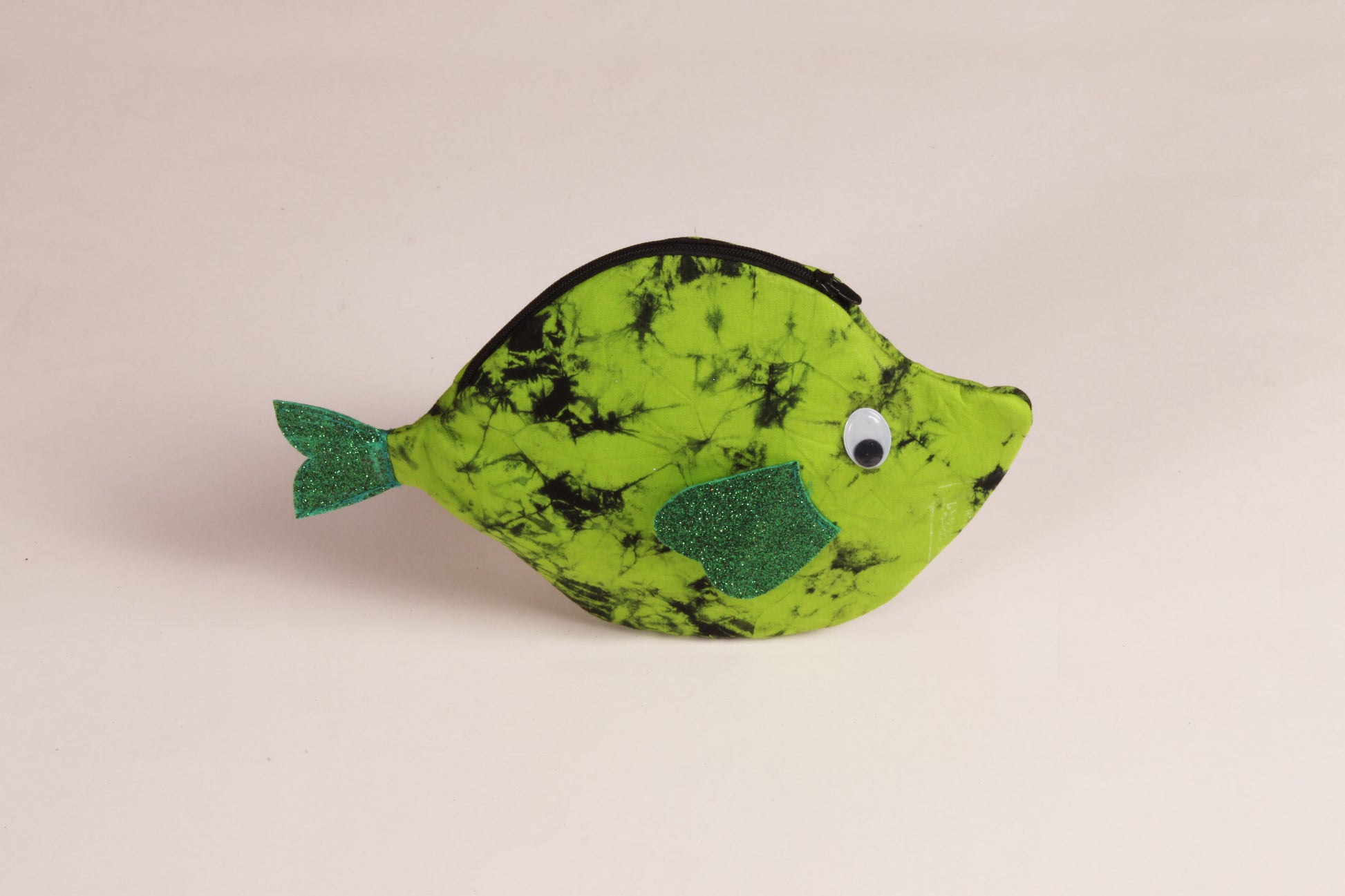 Side view of Green Pomfret Fish Pouch made from cotton fabric with a zip closure