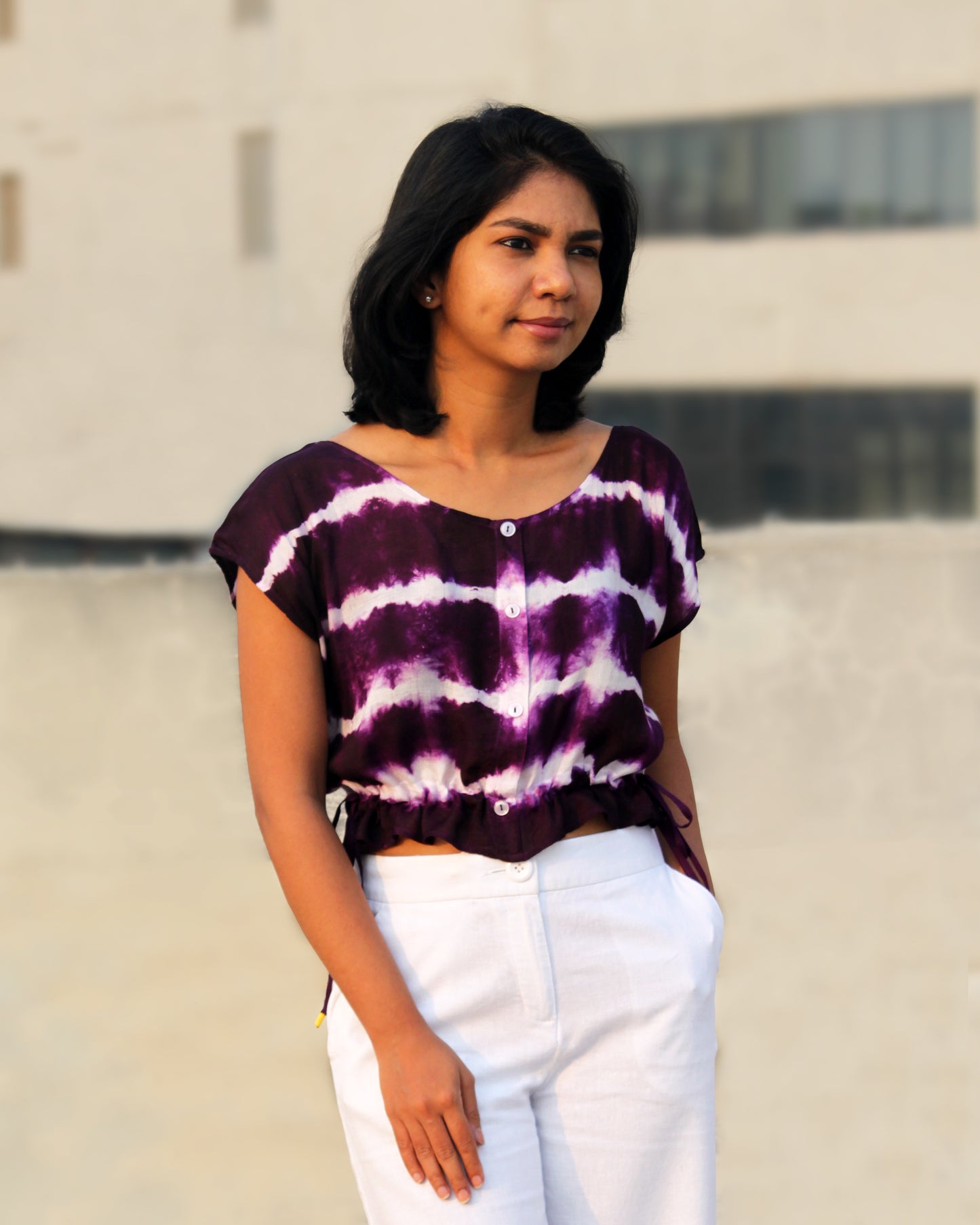 Front view of Tie Dye Violet White Crop Top in cotton blend with drawstring detail at waist