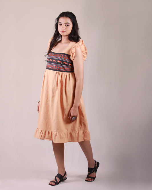 Closeup front view of Terracotta Midi Dress in cotton with drawstring details and flare sleeves