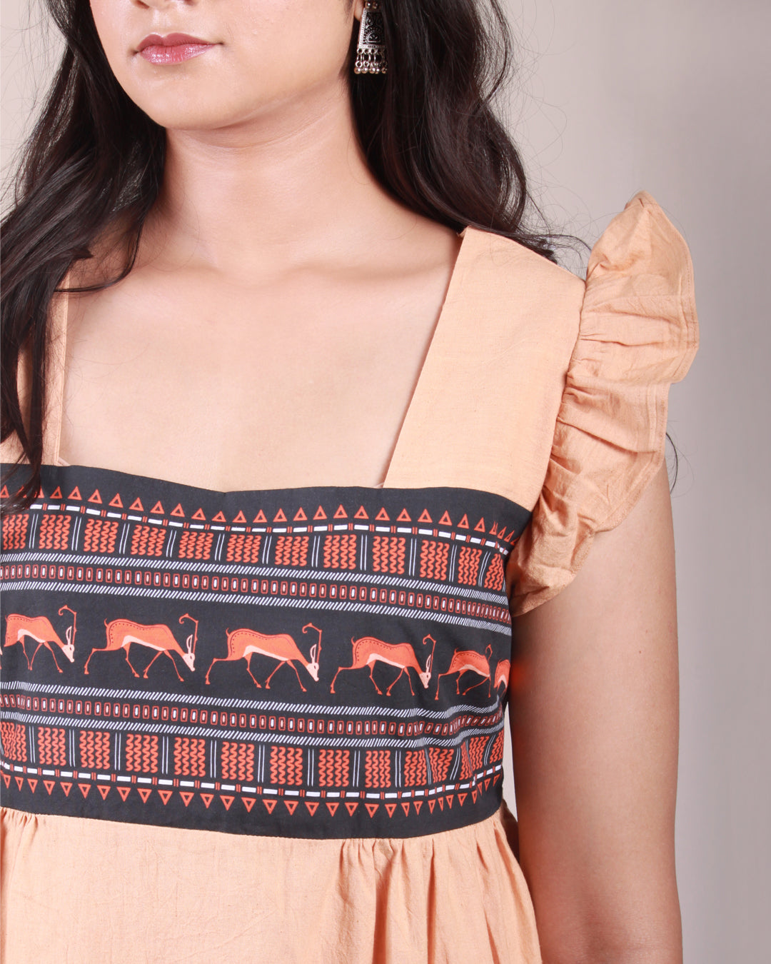 Print detail close up of Terracotta Midi Dress in cotton with drawstring details and flare sleeves