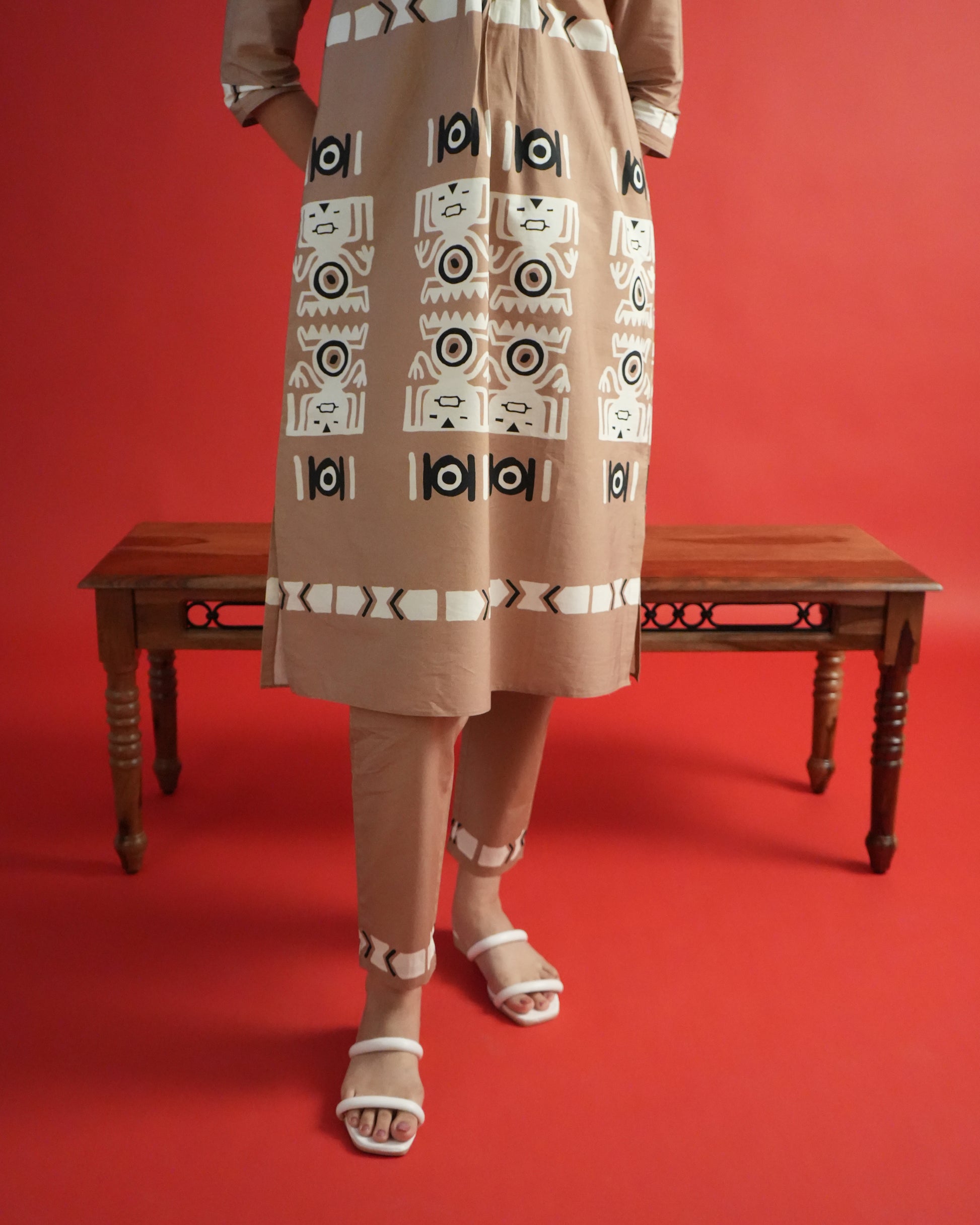 Fabric close-up of beige cotton with tribal-inspired motifs from the Chaki Co-ord Set