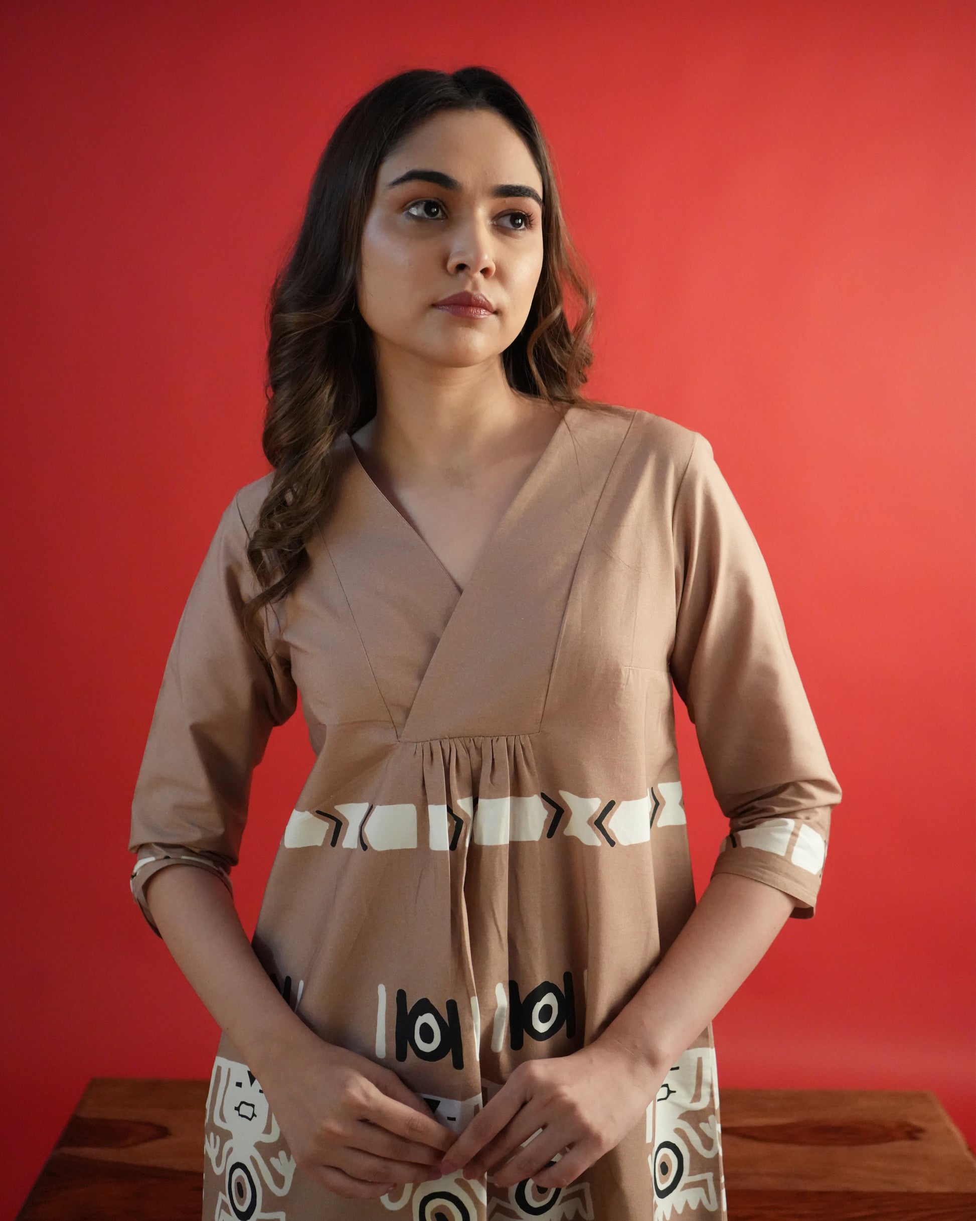 Close-up of tribal motif details on the beige cotton empire-line kurta from the Chaki Co-ord Set