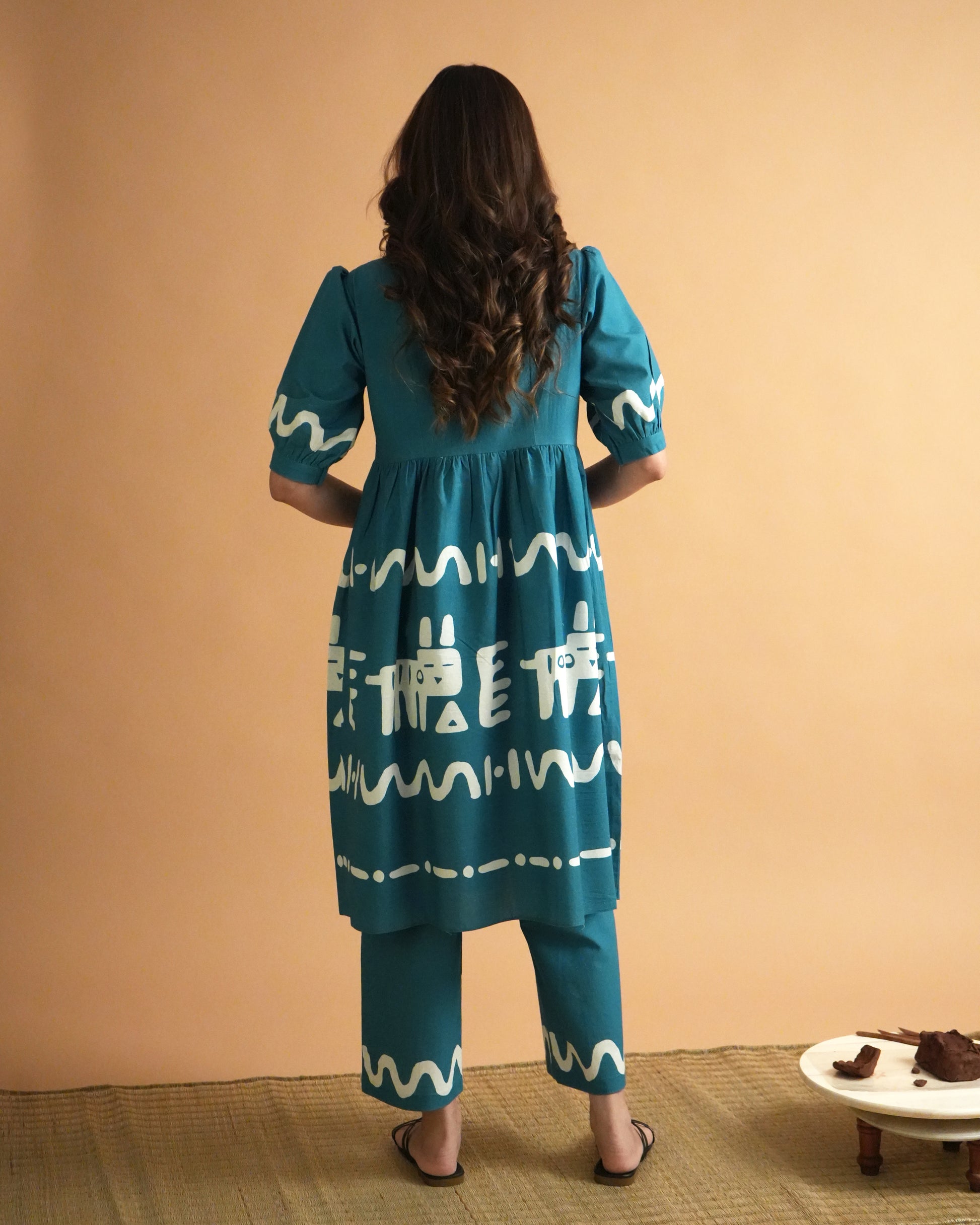 Back view of teal blue Polu Cotton Kurta Co-ord Set showing puff sleeves and wide-leg trousers