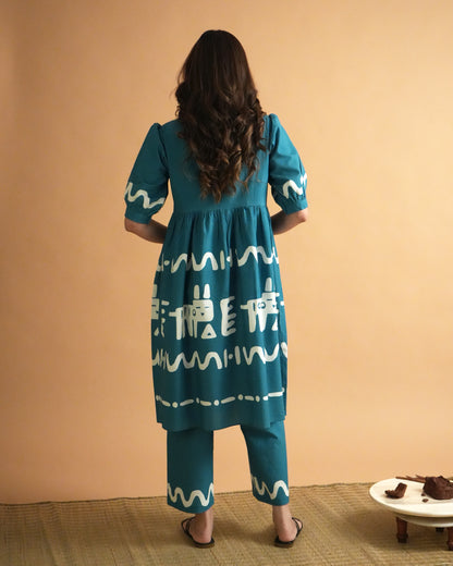 Back view of teal blue Polu Cotton Kurta Co-ord Set showing puff sleeves and wide-leg trousers