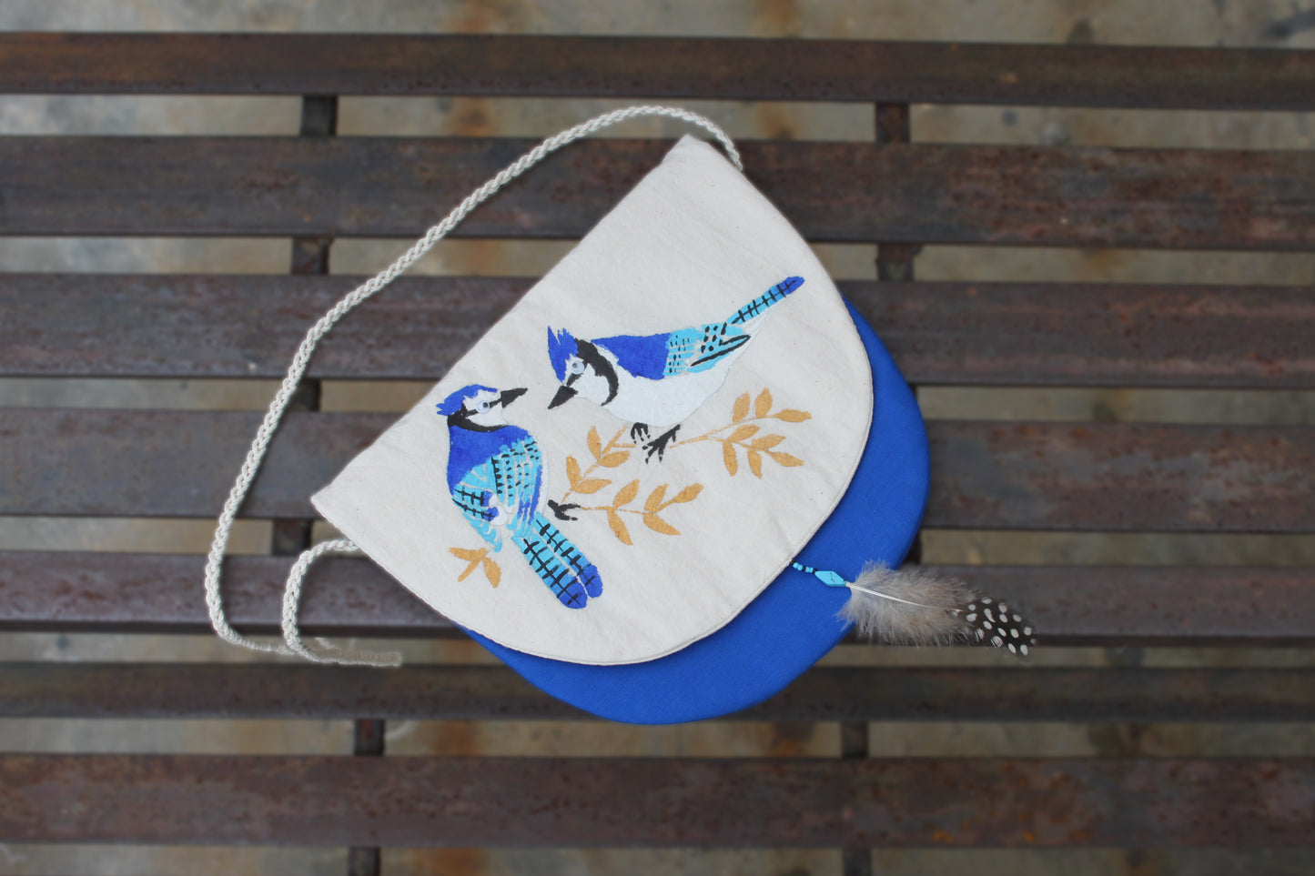 Front flap view of handpainted Blue Jay Sling Bag made from cotton fabric