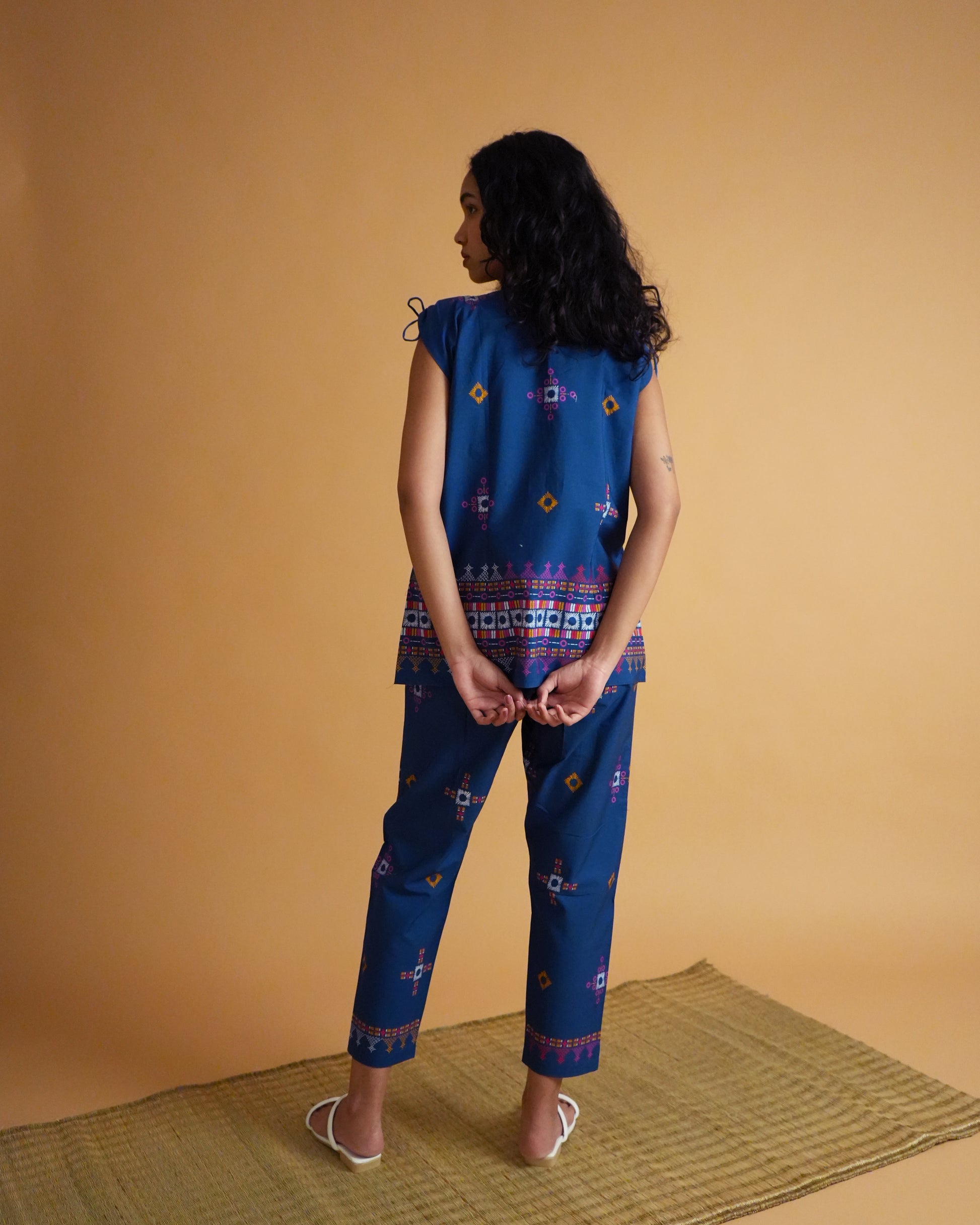 Back view of Selu Cotton Kurta Co-ord Set showing blue kurta with shell details and straight pants