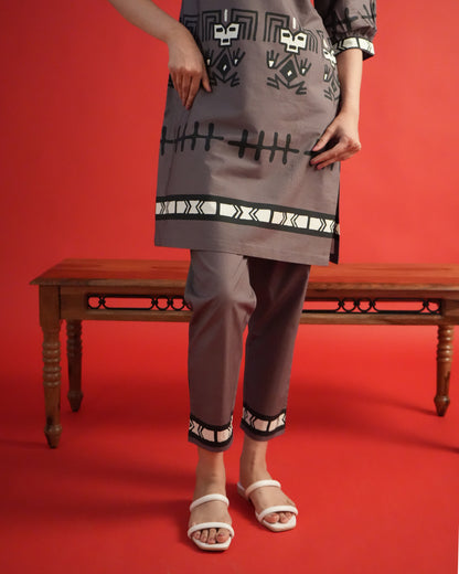Fabric close-up showing tribal motifs on the rich brown Tua Cotton Co-ord Set