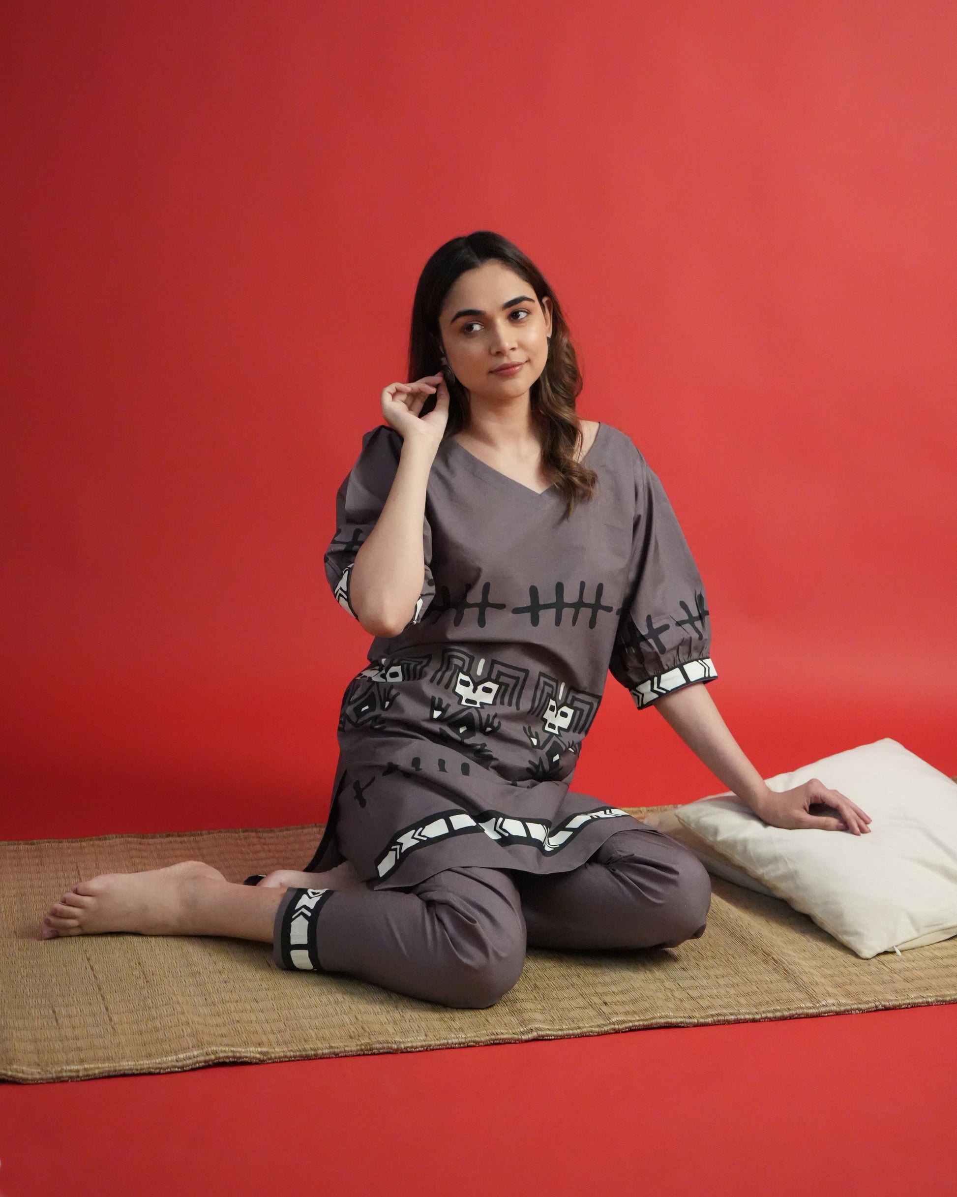 Model wearing Tua Cotton Co-ord Set in brown with V-neck kurta, puffed sleeves, and narrow pants