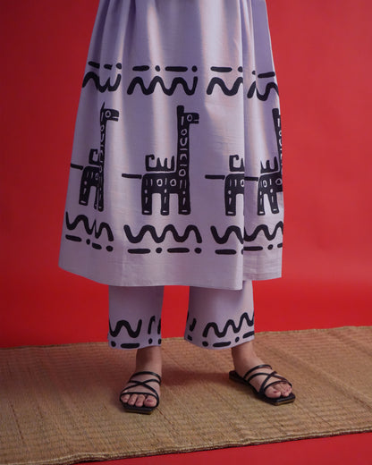 Fabric close-up showing tribal motifs on lavender cotton from the Usu Cotton Co-ord Set