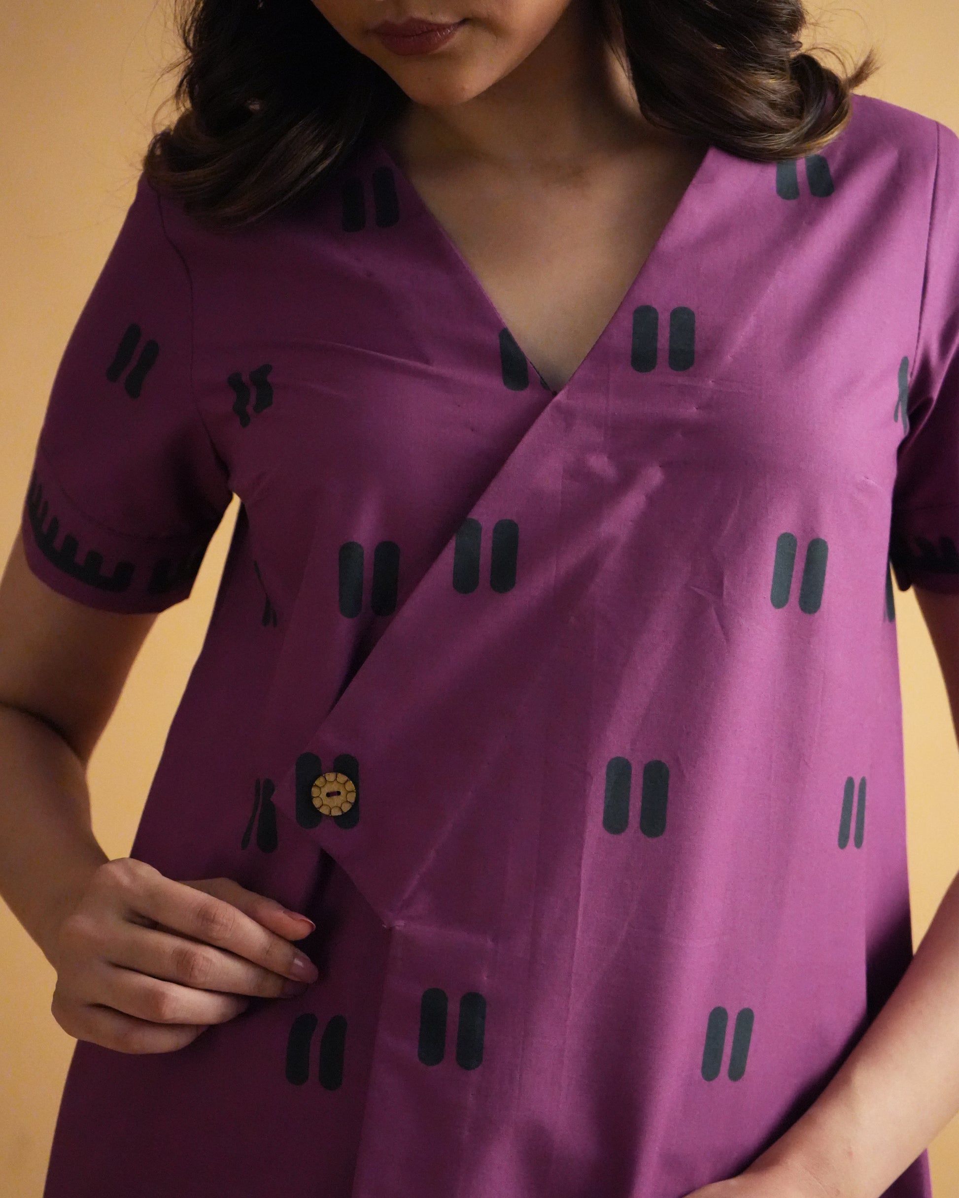 Zoomed-in view of tribal print on violet cotton from the Papuro Cotton Co-ord Set