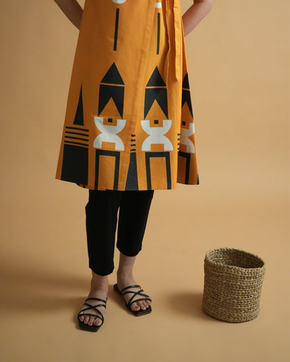 Fabric close-up showing tribal prints on orange cotton from the Kara Cotton Co-ord Set