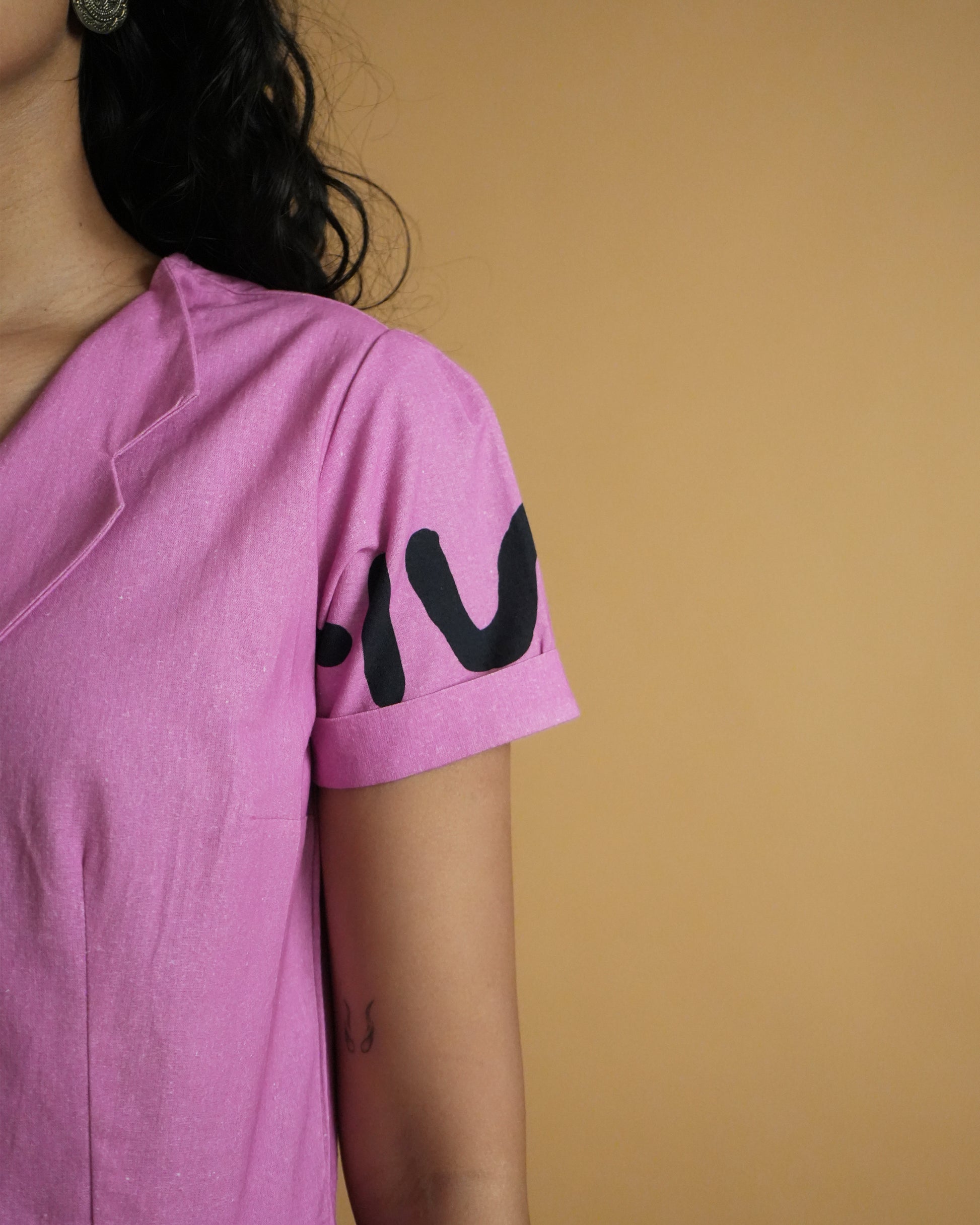 Detailed shot of cuffed sleeves and neckline design on the Jambu Cotton Kurta Co-ord Set in pink