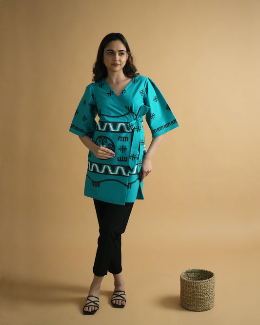 Front view of Biru Cotton Co-ord Set in turquoise with wrap-style kurta, tie detail, flared sleeves, and slim pants