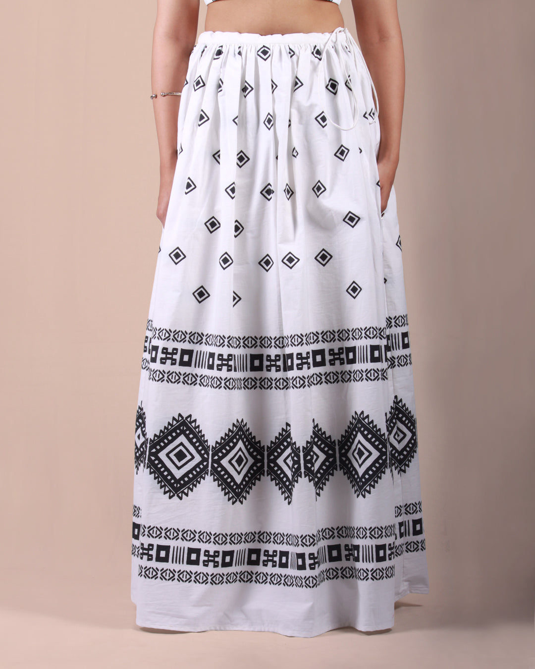 Ivory tribal co ord set for women gathered skirt closeup  