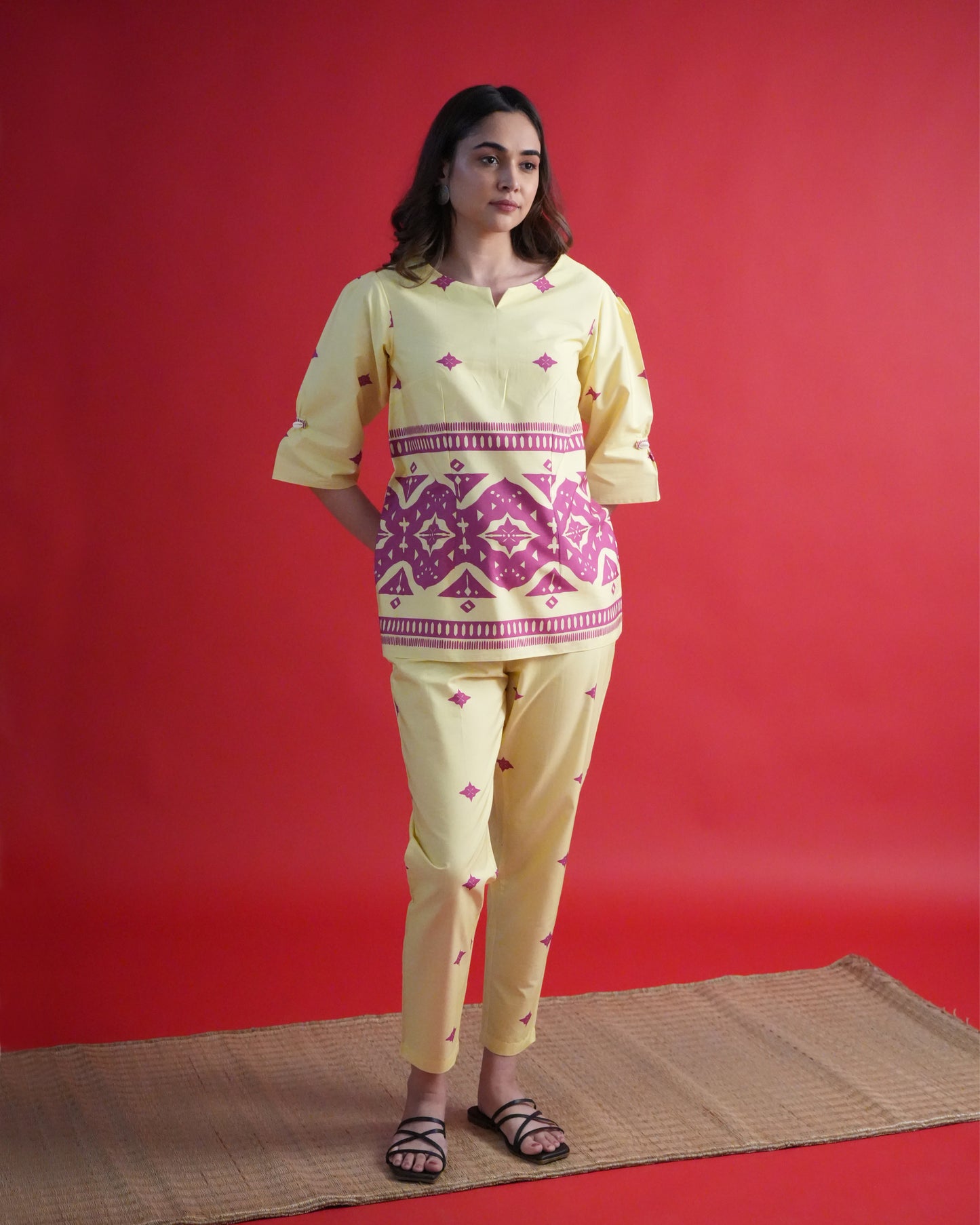 Front view of Yona Cotton Co-ord Set in lemon yellow with shell loop sleeves, tribal prints, and straight-fit pants