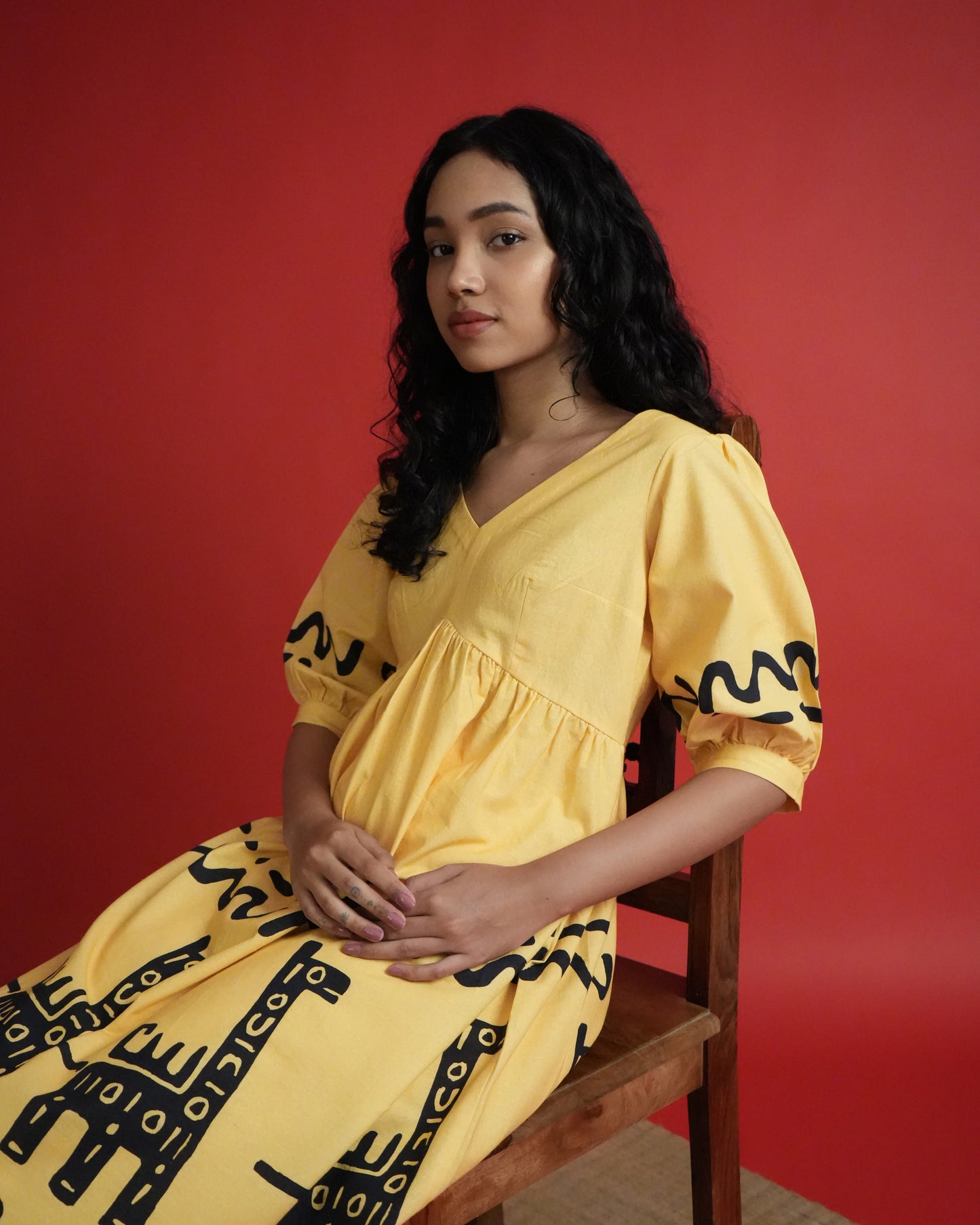 Detailed shot of neck line and empire-line design in mango yellow cotton from the Sikwu Cotton Kurta Co-ord Set